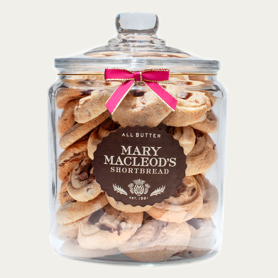 two quart glass cookie jar of mary macleod's signature chocolate crunch - all-butter handcrafted shortbread cookies, with accented red bow