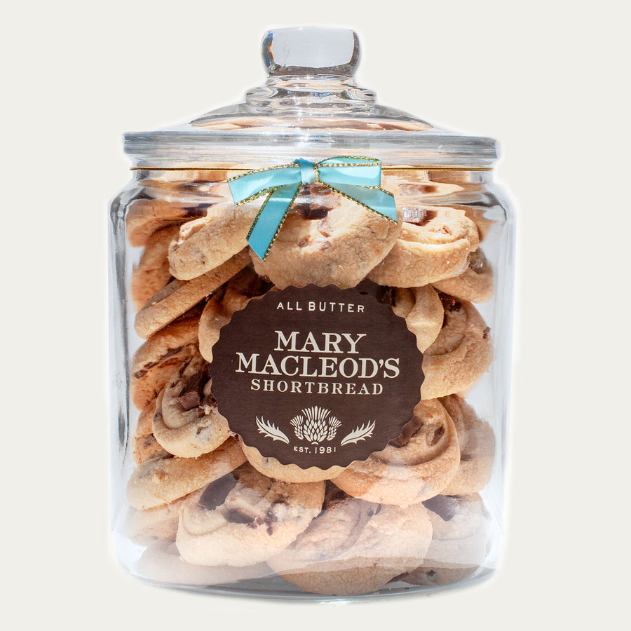 two quart glass cookie jar of mary macleod's signature chocolate crunch - all-butter handcrafted shortbread cookies, with accented blue bow