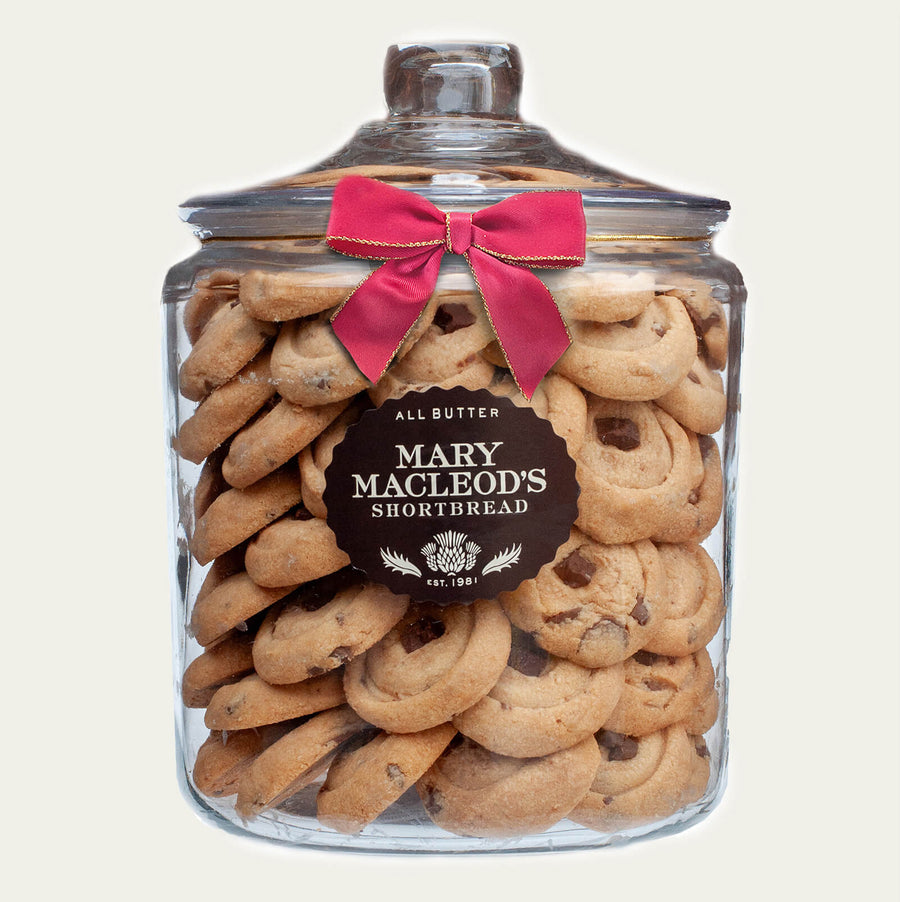 Mary Macleod's Shortbread 4-quart cookie jar filled with signature chocolate crunch of all-butter shortbread cookies, including classic and chocolate flavors, tied with a red ribbon