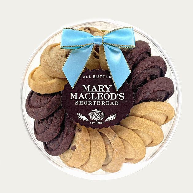 7 inch round clear packaging with ocean blue bow filled with assorted shortbread cookies