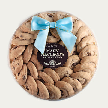 9 Inch Clear Transparent Round package of Mary Macleod's Shortbread with 36 premium artisanal gourmet signature chocolate crunch all-butter shortbread cookies, accented with our tiffany ocean blue bow, premium holiday Christmas gift 