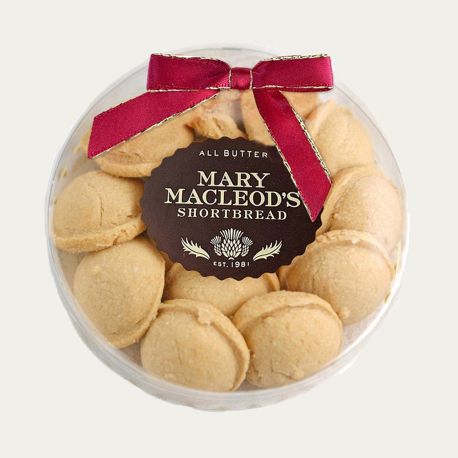 clear 4 inch short round of Maple Crunch shortbread cookies with Beauty Red accent bow