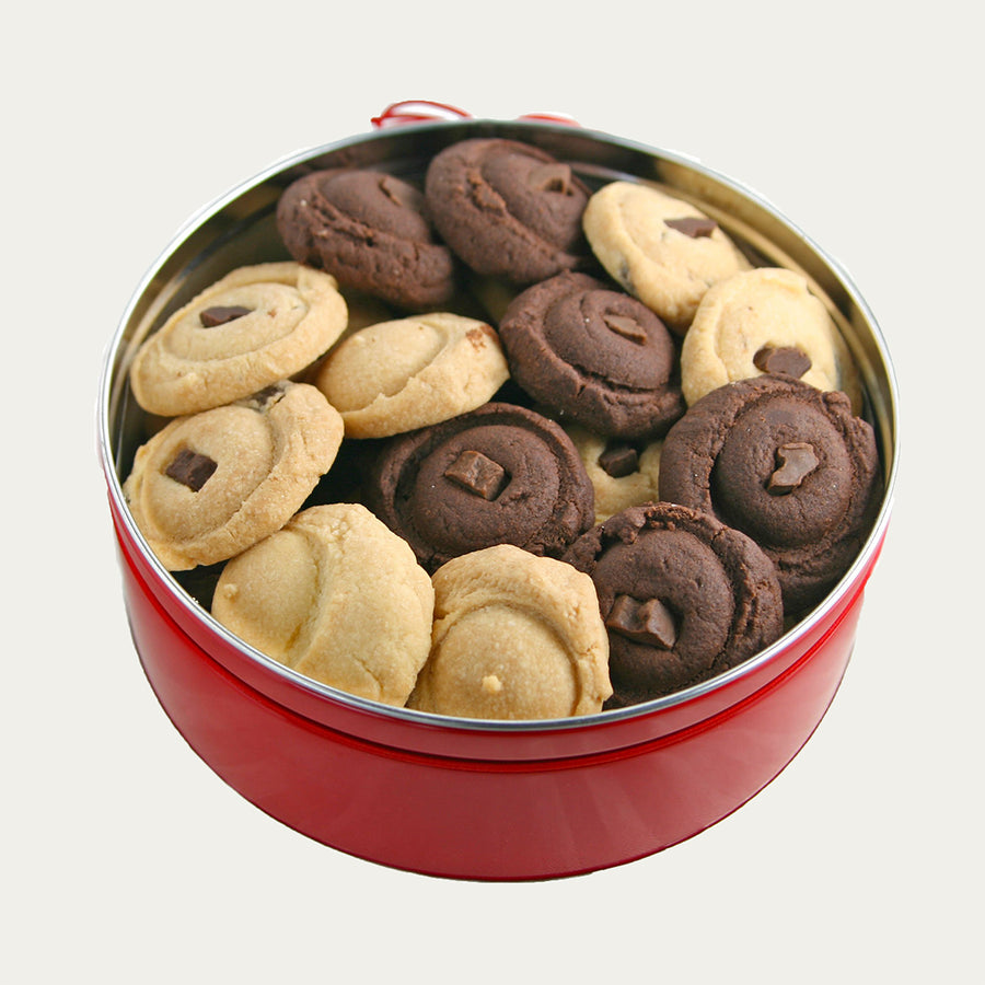 Medium red tin of assorted shortbread cookies. 
